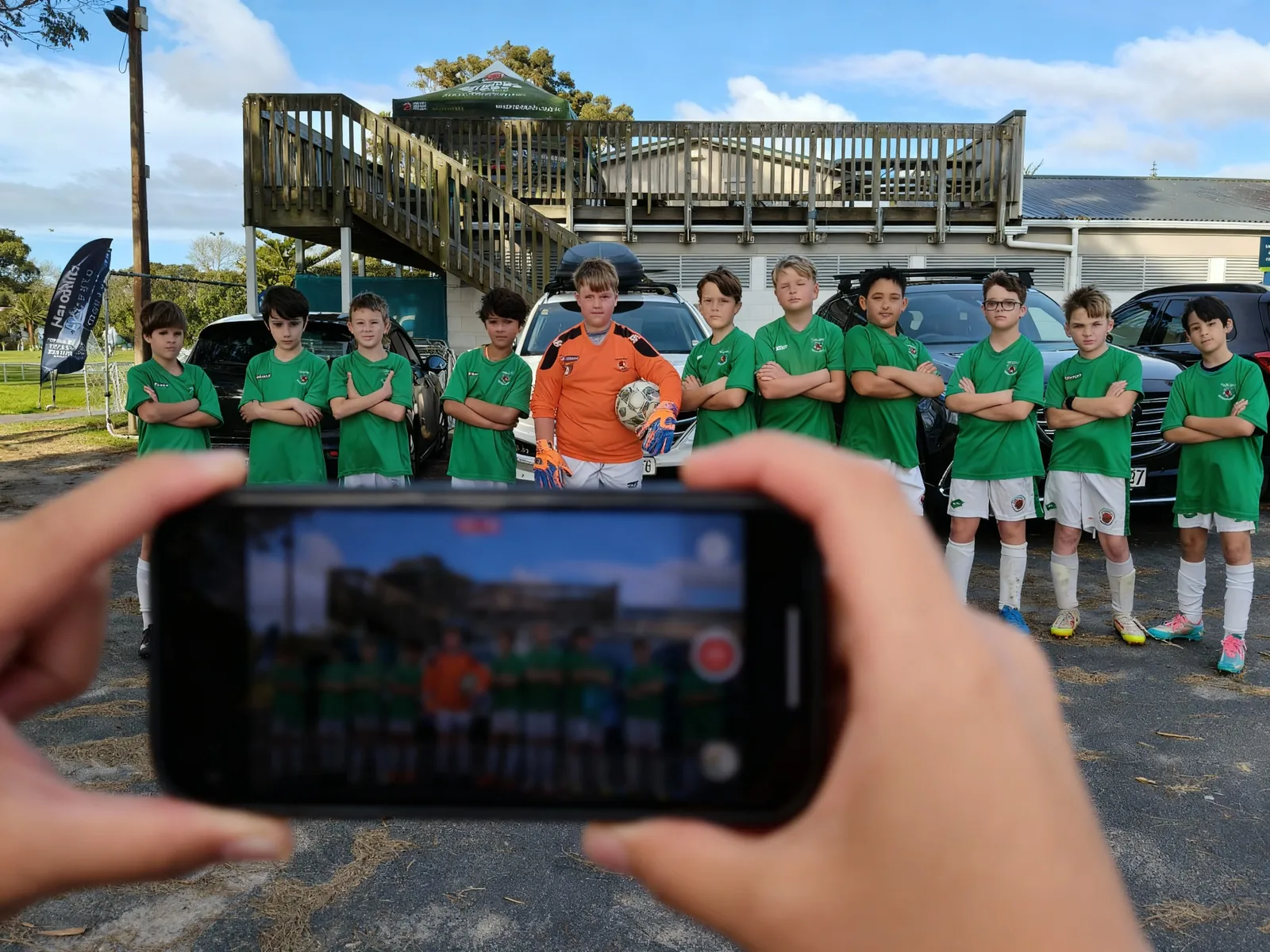 Taking a team photo on a mobile phone